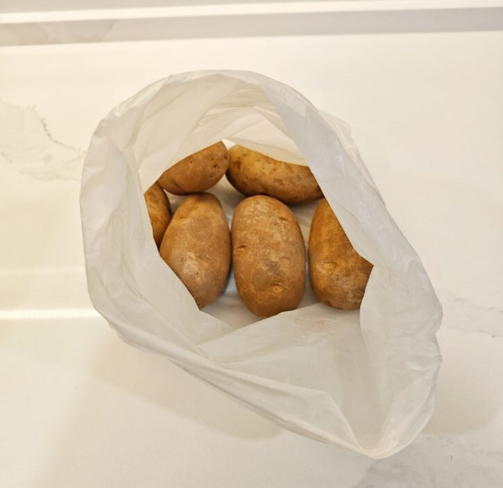Potatoes In Plastic Bag