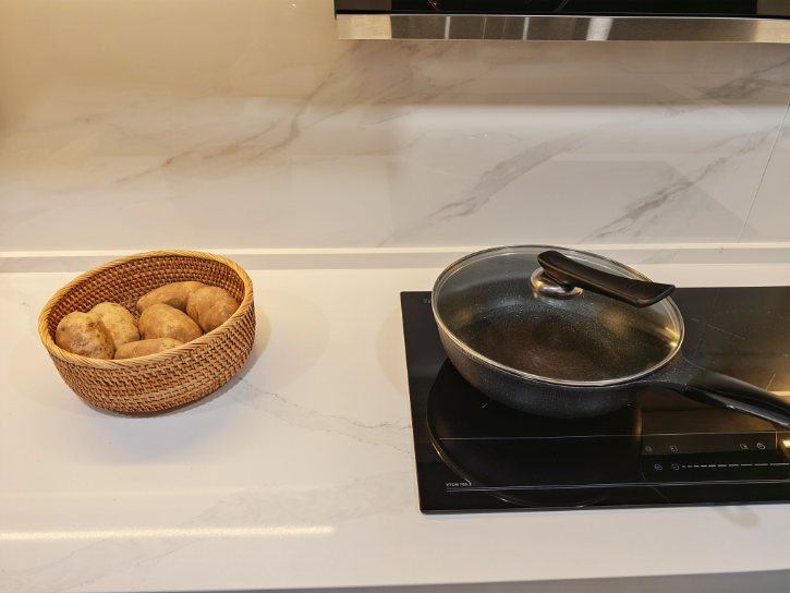 Potatoes Near Stove On Counter