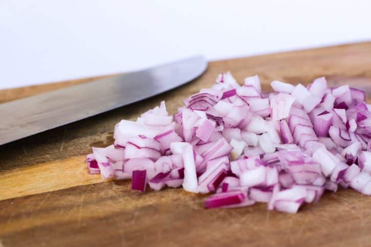 Chopped Red Onions On Board