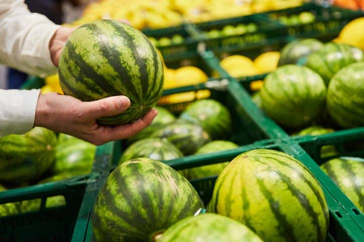 Weighing Watermelon In Grocery Store