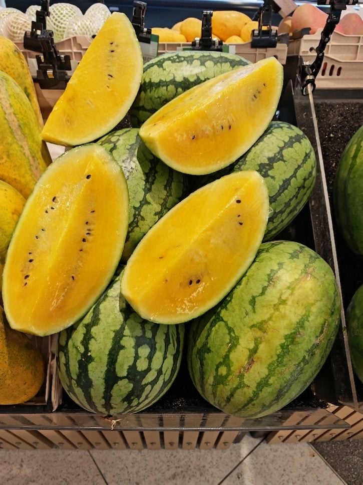 Yellow Watermelon Slices In Market