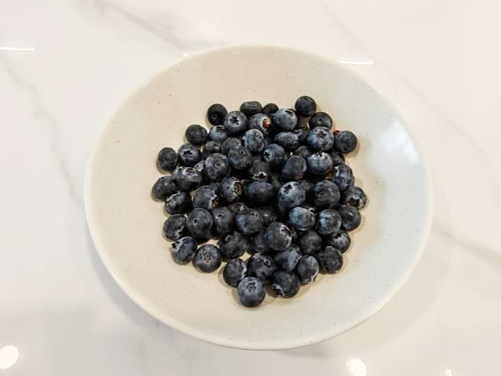 Fresh Blueberries in White Plate